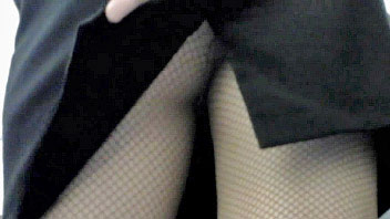 Ut_1623# Slender beauty in a tight black skirt was perfect for upskirt porn pics. Slender legs and a