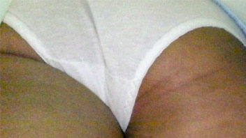 Ut_2240# Well-tanned pinup girl in blue miniskirt. The upskirt camera was examining her legs, white 