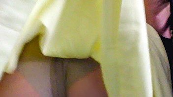 Ut_1930# Bimbo babe in wide yellow dress. She was in a rush and was running on escalator. The upskir