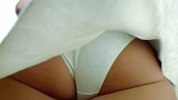 Ut_1474# A slender girl in a short white sarafan. Beautiful round booty in white panties. The girl d