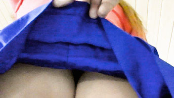 Ut_2521# Young girl in short blue skirt. Our operator was raising her skirt few times and made some 