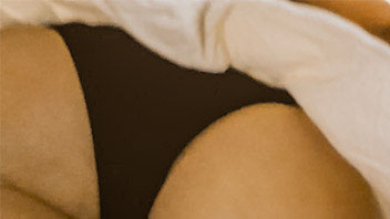 Ut_2360# Slender brunette chick in short white skirt. The cameraman could tape her nice round butt i