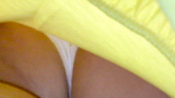 Ut_1931# Brunette babe in short yellow dress. The operator could make some successful upskirt porn c