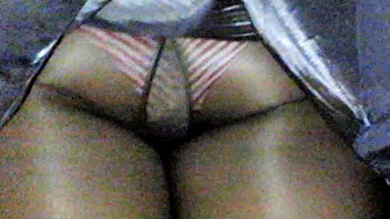 Ut_1437# This young woman had striped white-red panties and tights under her skirt. I've managed to 