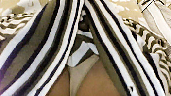 Ut_2331# A girl in short striped skirt. Nice round butt in white panties in close up. It is easy to 