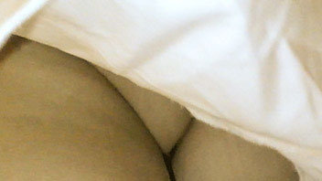 Ut_2566# Exciting slender brunette babe in narrow white skirt. The cameraman was raising her skirt f
