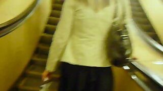 UT_836#I decided to follow a new object; it was slim tall girl in a white jacket and black s