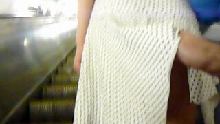 UT_1258#Here comes slim brunette in short white dress. I digressed while I was filming her cu